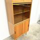 Bibliothèque vitrine modulable vintage – bois blond & verre fumé (189 cm)