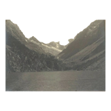 Photo in black and white mountain lake in golden frame
