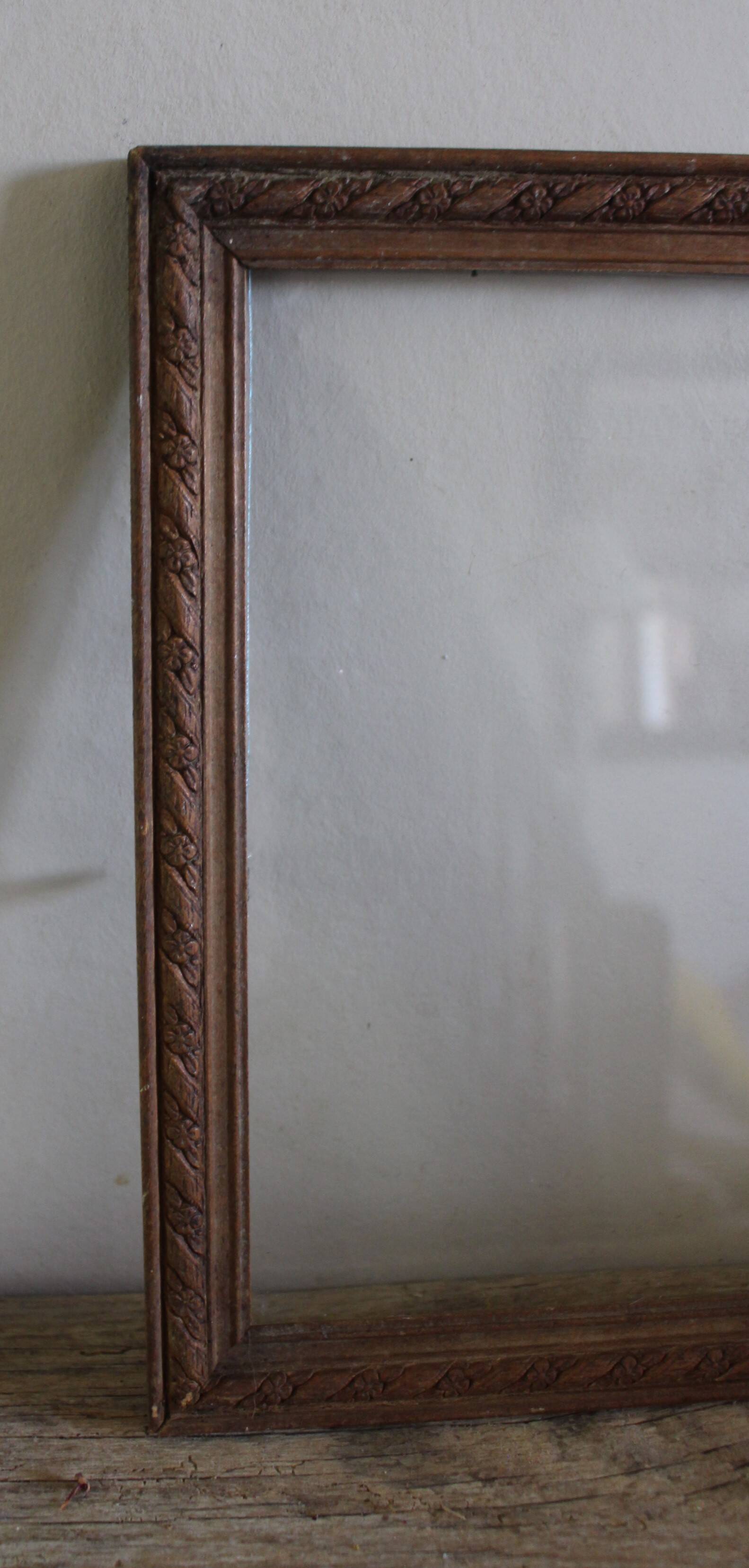 Wood frame old window small flowers framing