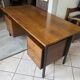Scandinavian double-sided executive desk in rosewood and metal with 6 drawers.
