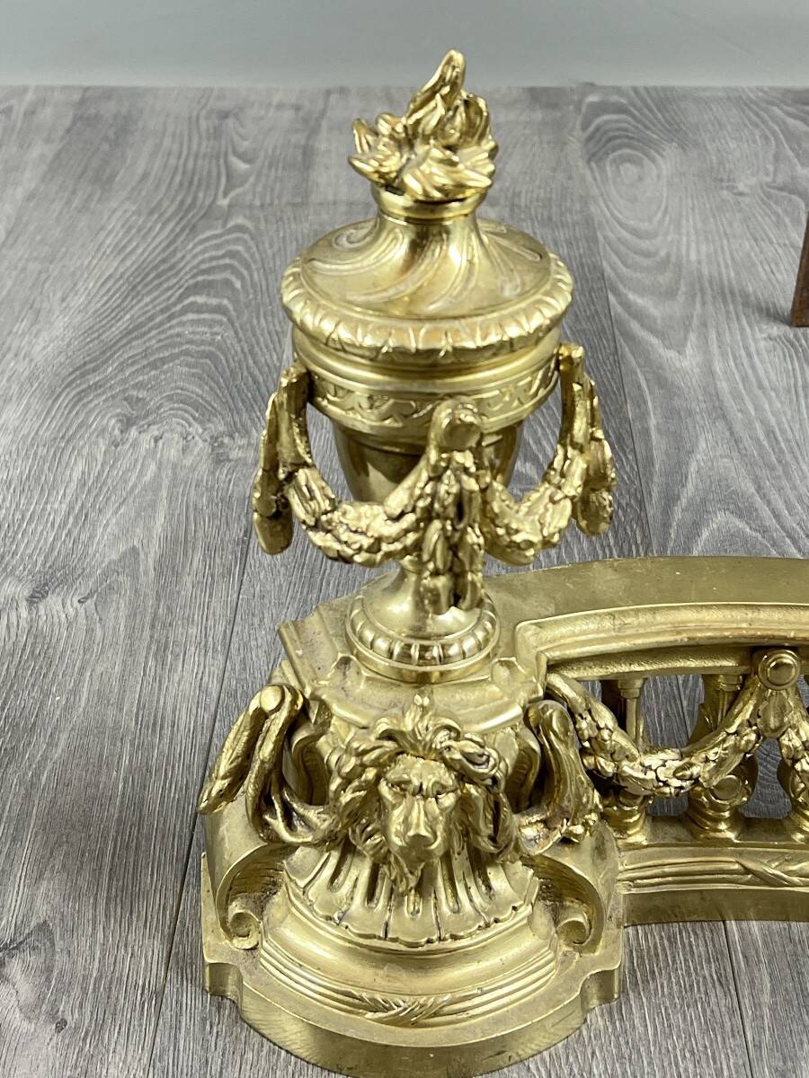 Pair of gilded bronze andirons, Louis XVI style, 20th century