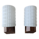 Philips wall sconces in wood and white opal.