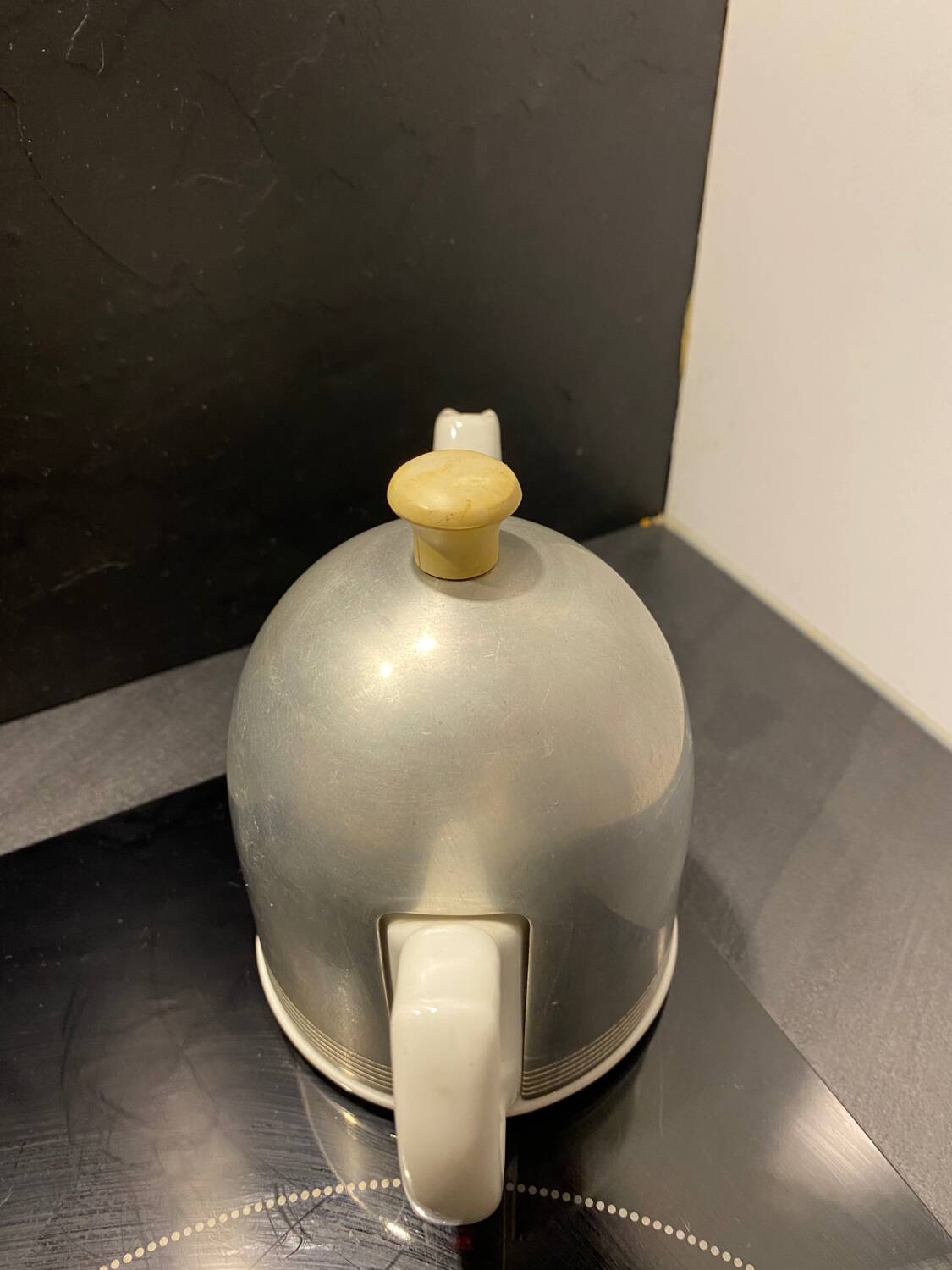 Nomar porcelain and steel teapot