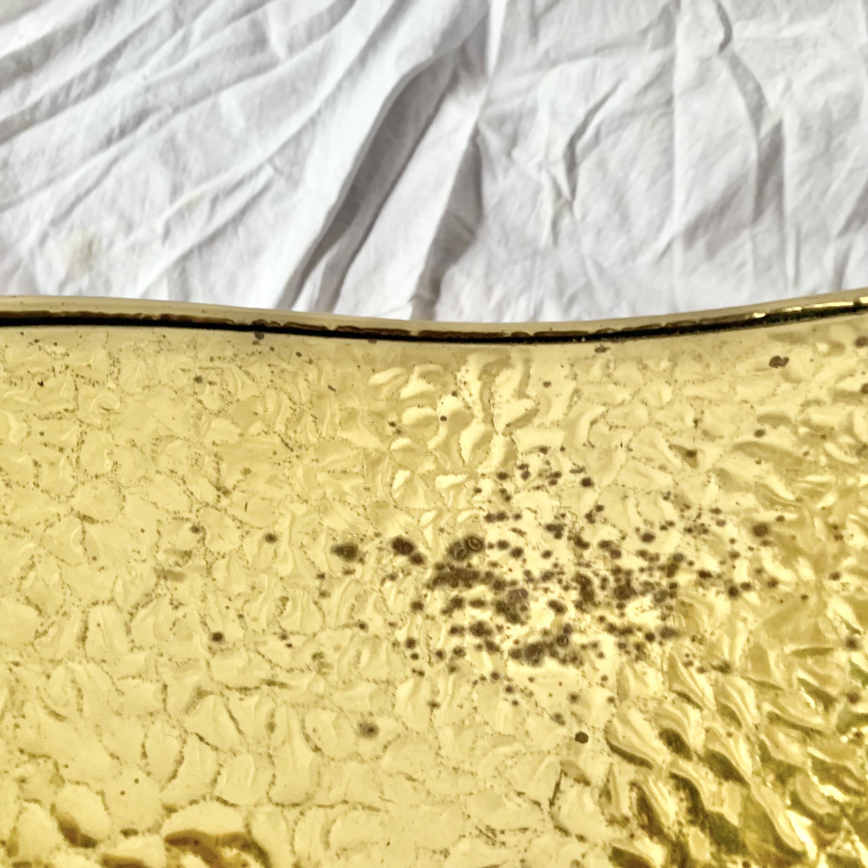 Vintage hammered brass log holder