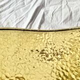 Vintage hammered brass log holder