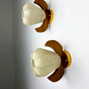 Pair of pear-shaped "Cocoon" wall sconces, resin and pine wood, Italy, circa 1970s