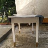 Table with extension cord that folds over the sides