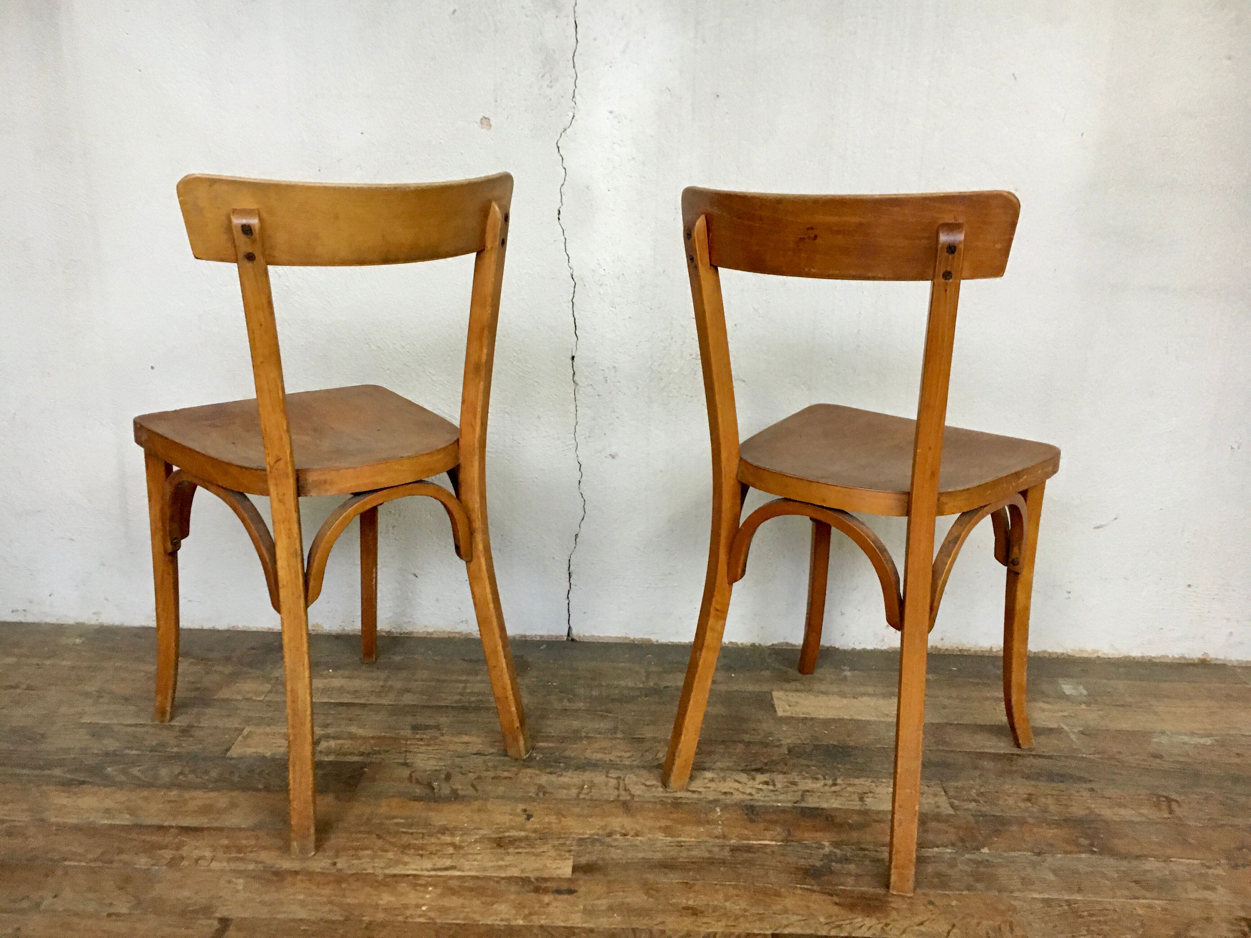 Pair of vintage clear beech baumann chair
