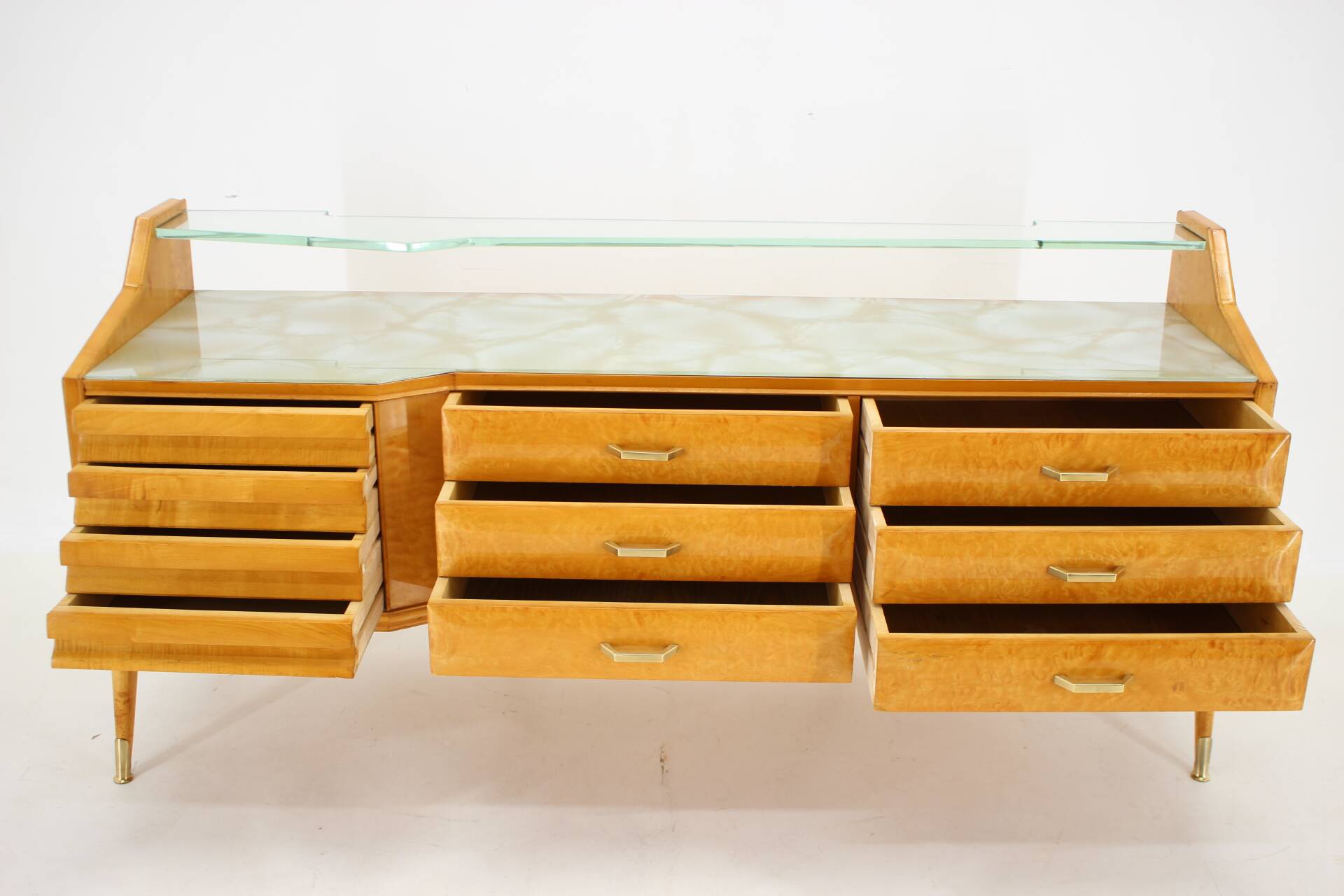 1960s italian sideboard/chest of drawers in high gloss finish with glass top and shelf
