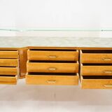 1960s italian sideboard/chest of drawers in high gloss finish with glass top and shelf
