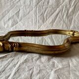 Large rococo mirror in gilded wood