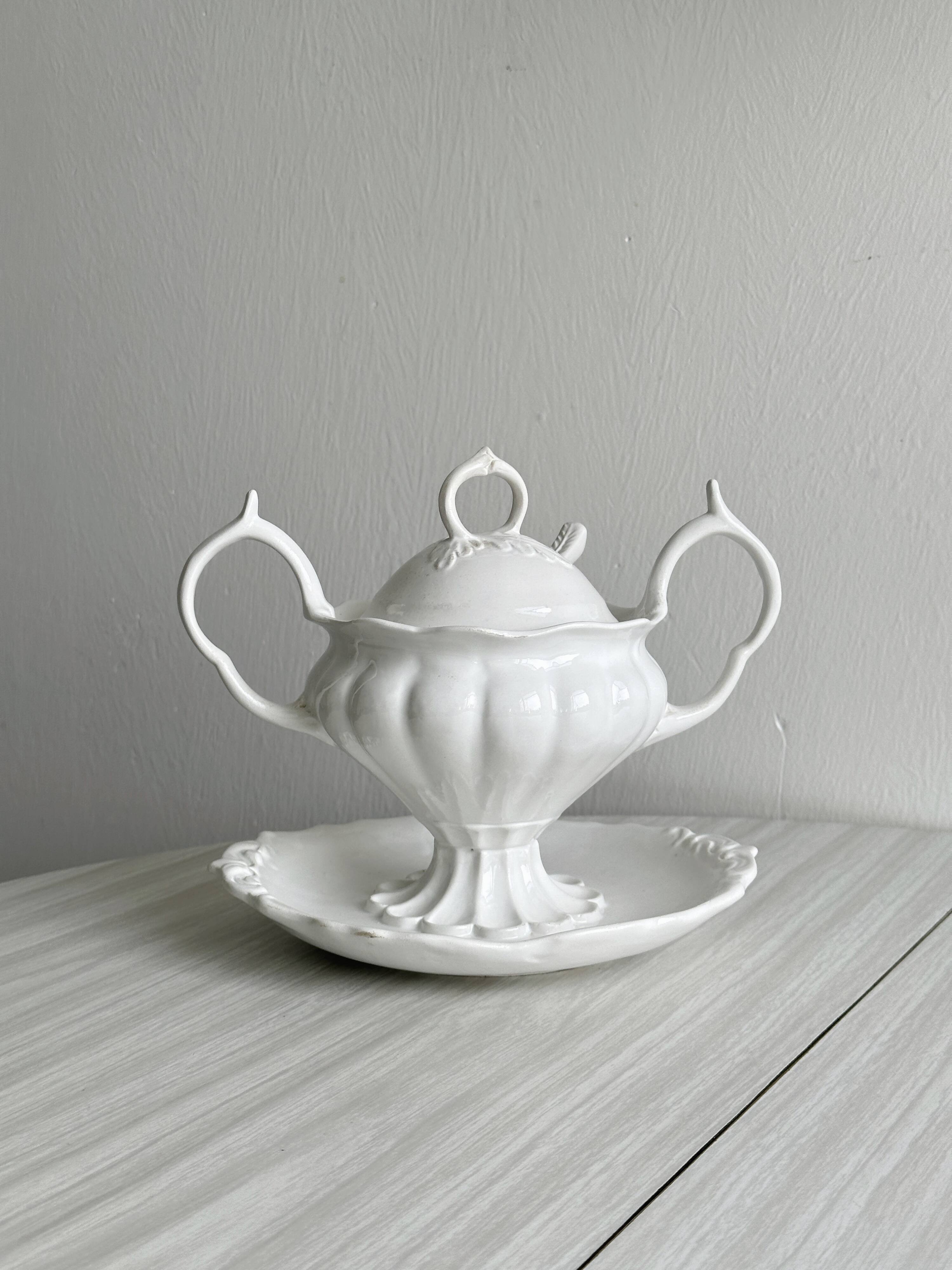 Antique white porcelain sauce boat