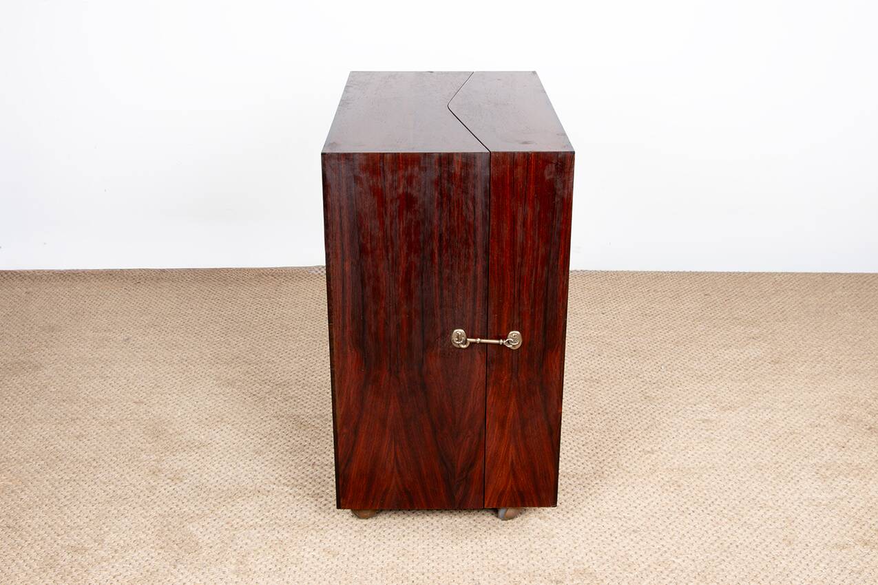 Danish bar cabinet on wheels in rosewood and brass by Jorgen Clausen