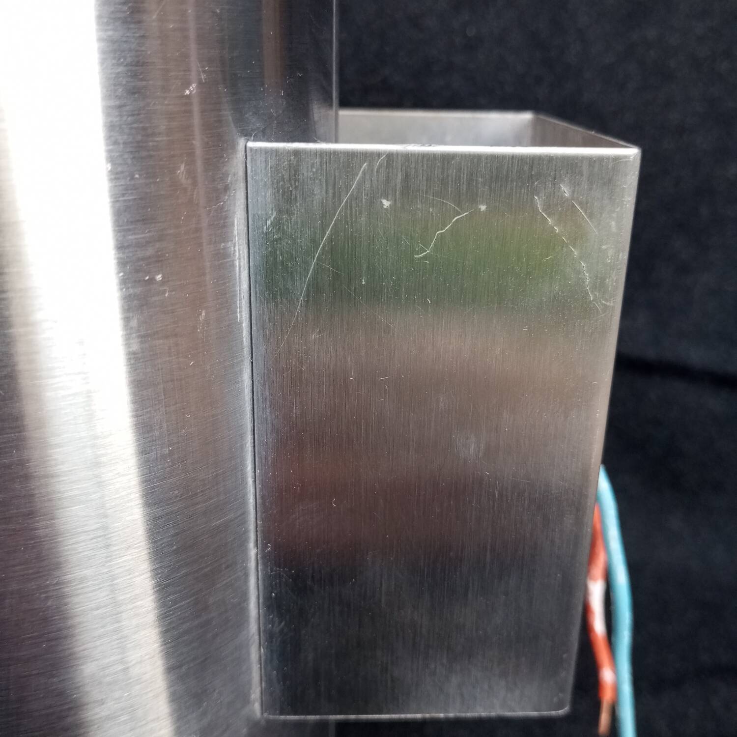 UFO wall light in aluminum and orange