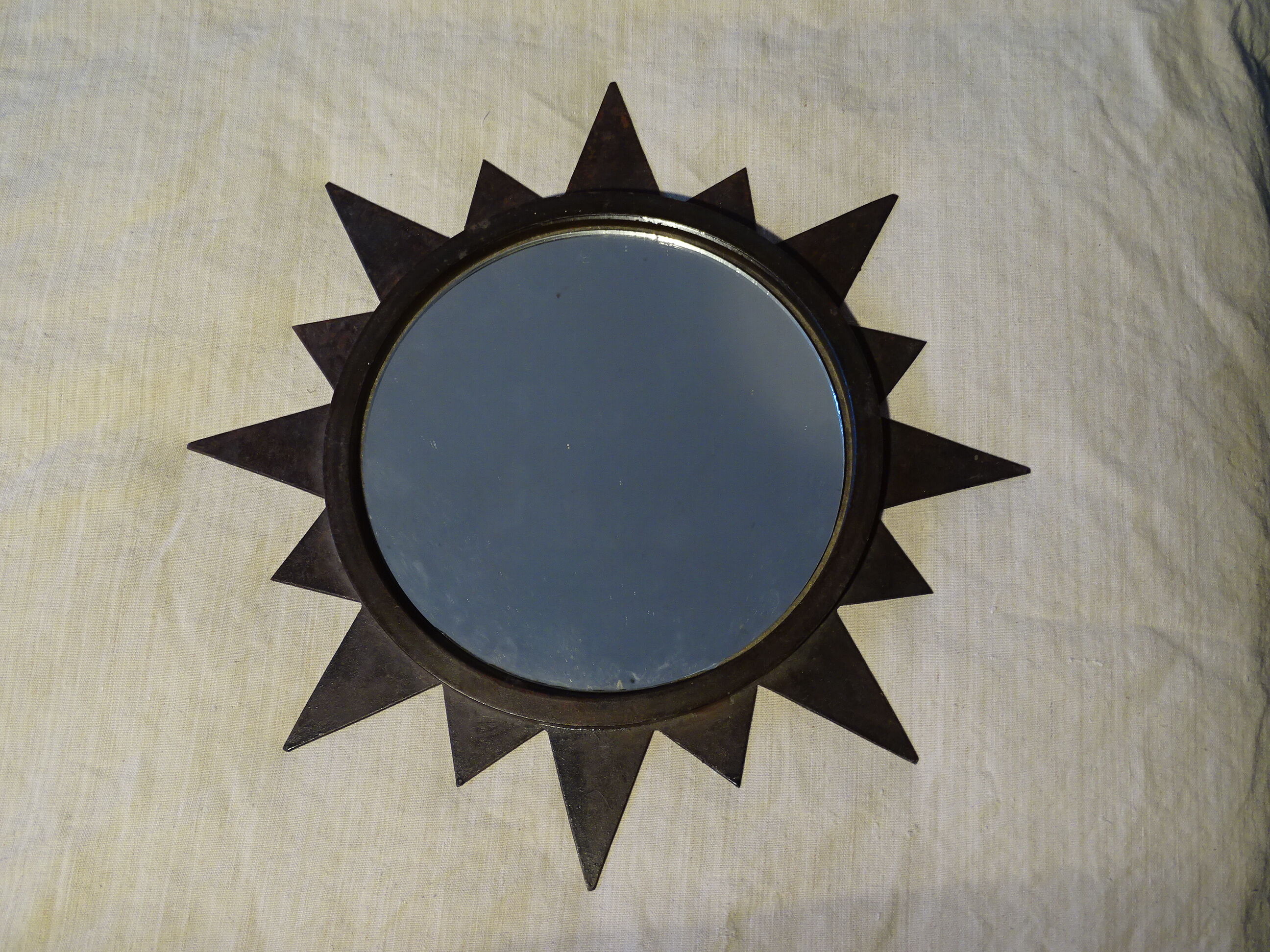 Iron sun mirror