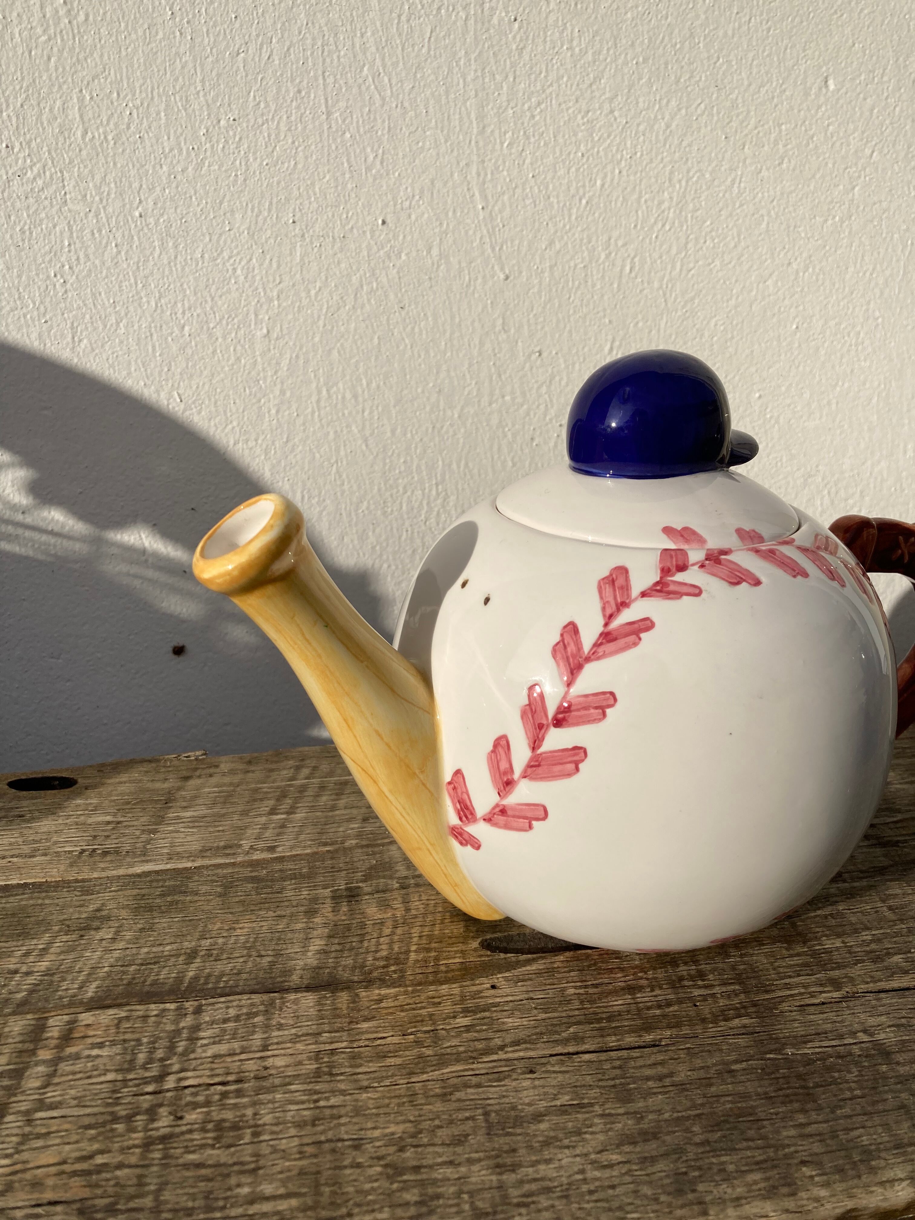 Teapot in white ceramic baseball