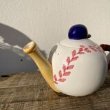 Teapot in white ceramic baseball