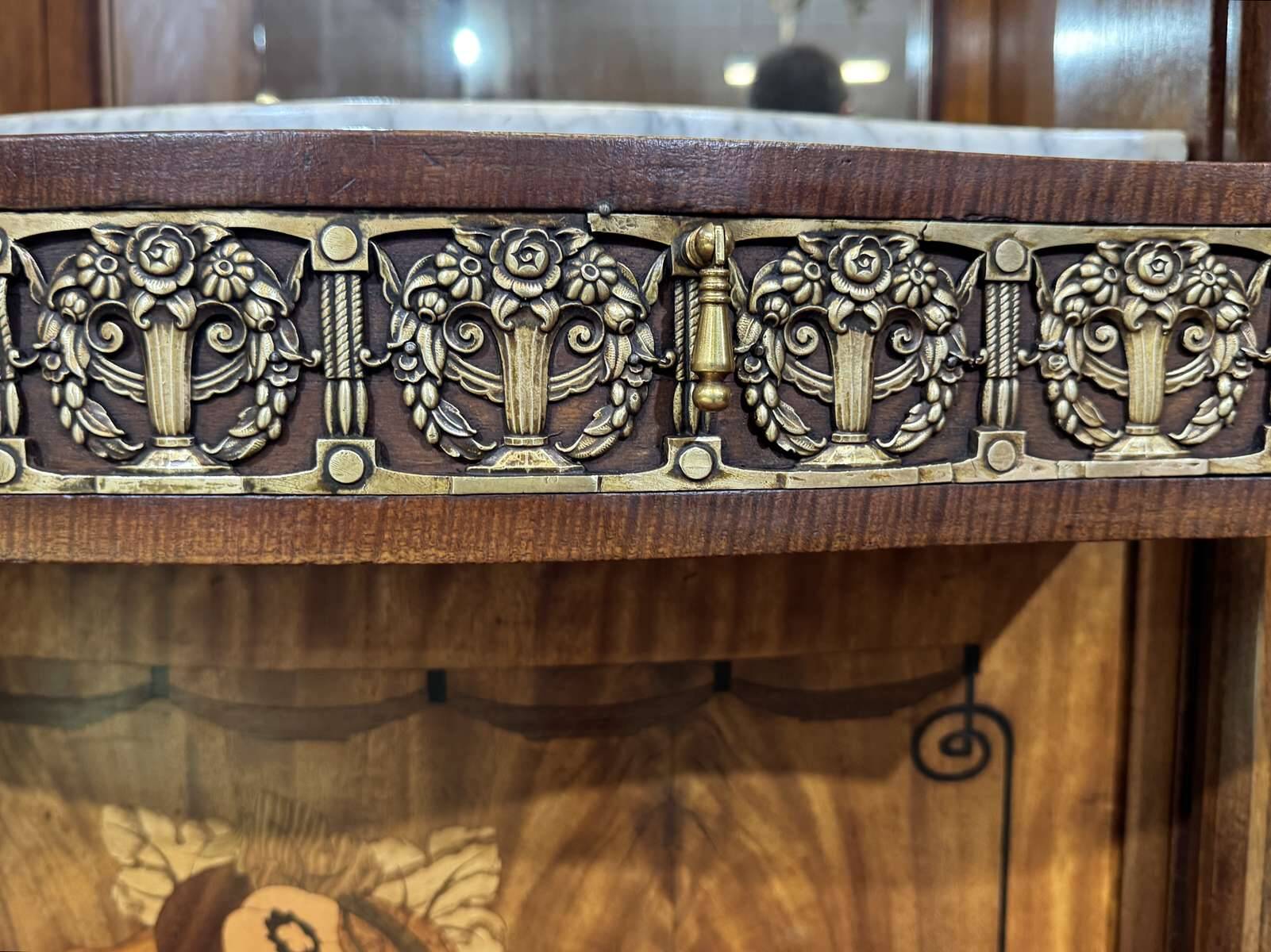 Art Deco buffet in mahogany, oak, and marble top.