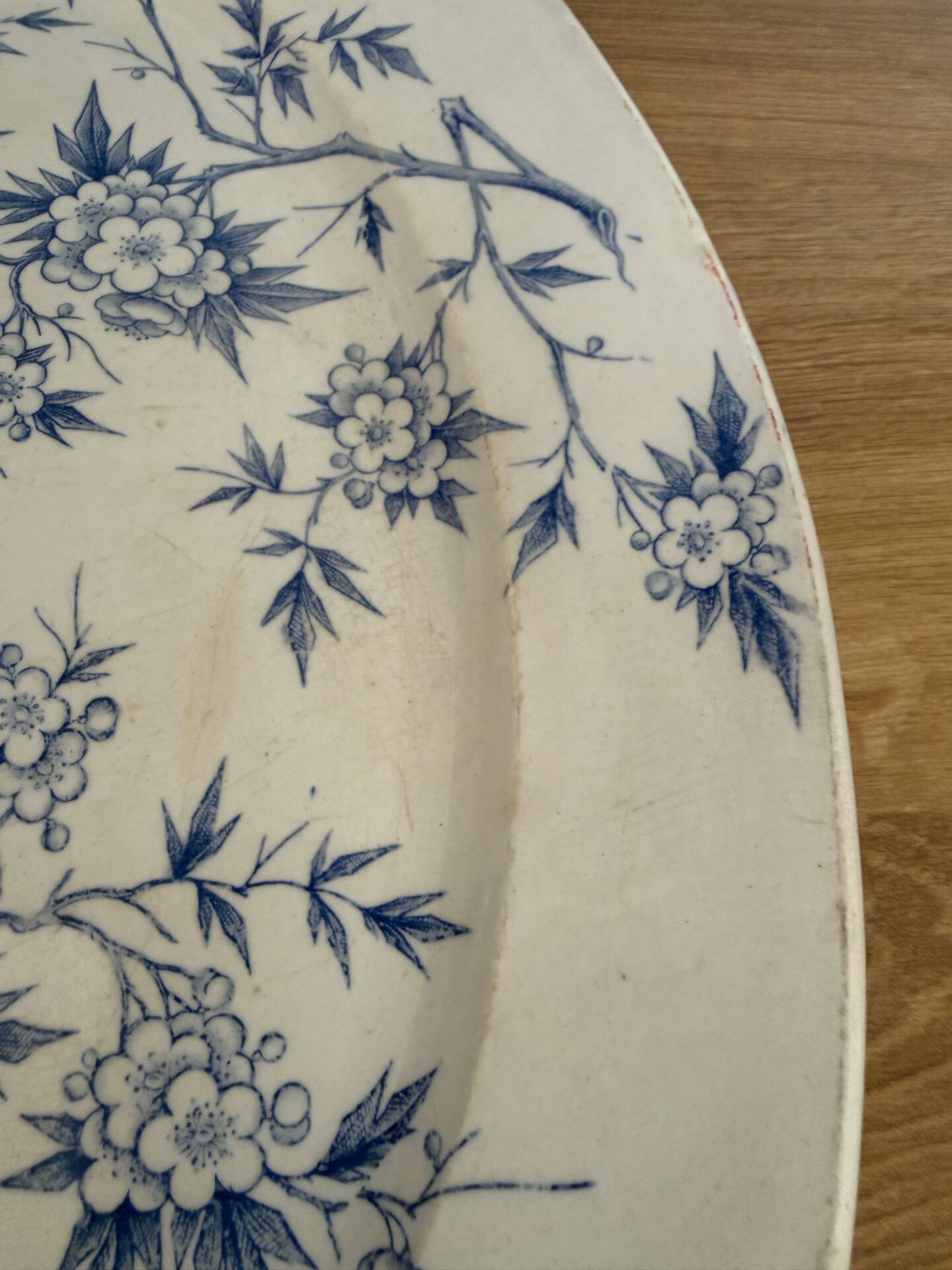 Old earthenware plate from Grigny – blue floral decoration