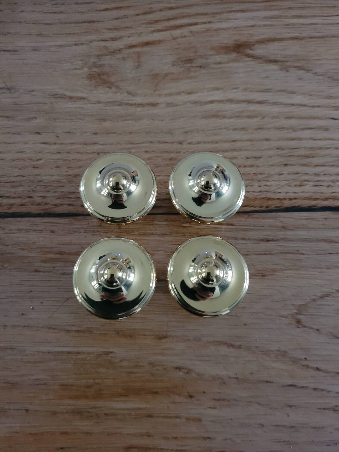 Polished brass furniture knobs