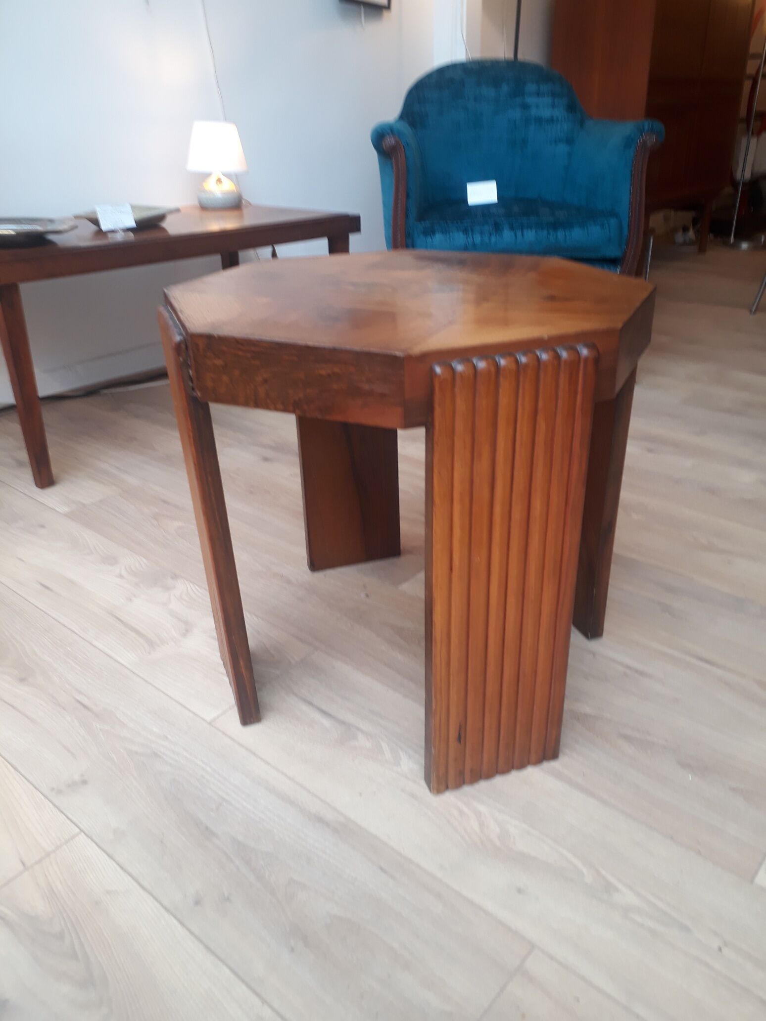 Octagonal side table in walnut veneer