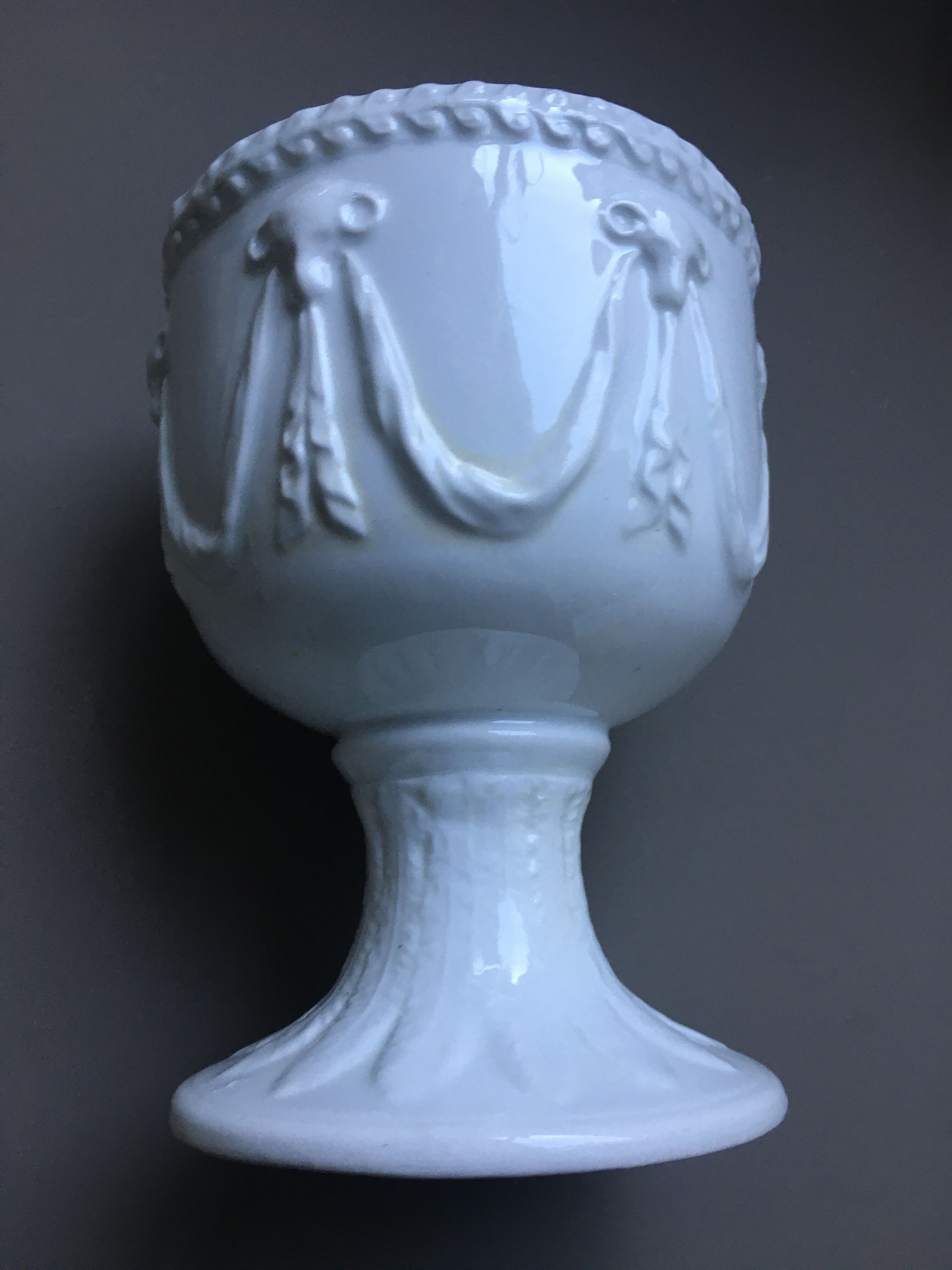 White chalice-cutting vase