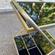 Mid-Century 1978 brass and black smoked glass wheeled dessert trolley.