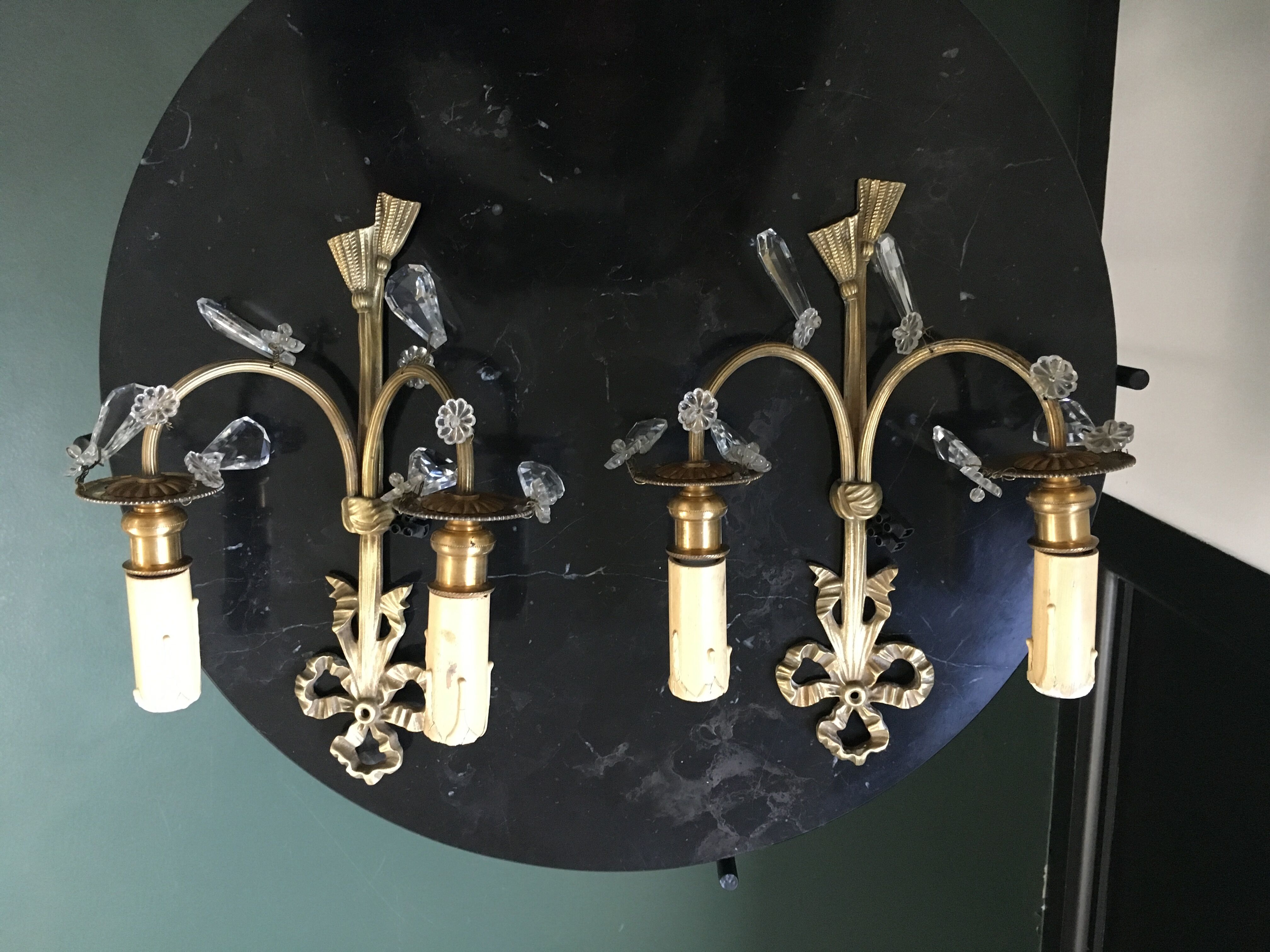 Paire d'appliques en bronze et pampilles