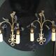 Paire d'appliques en bronze et pampilles
