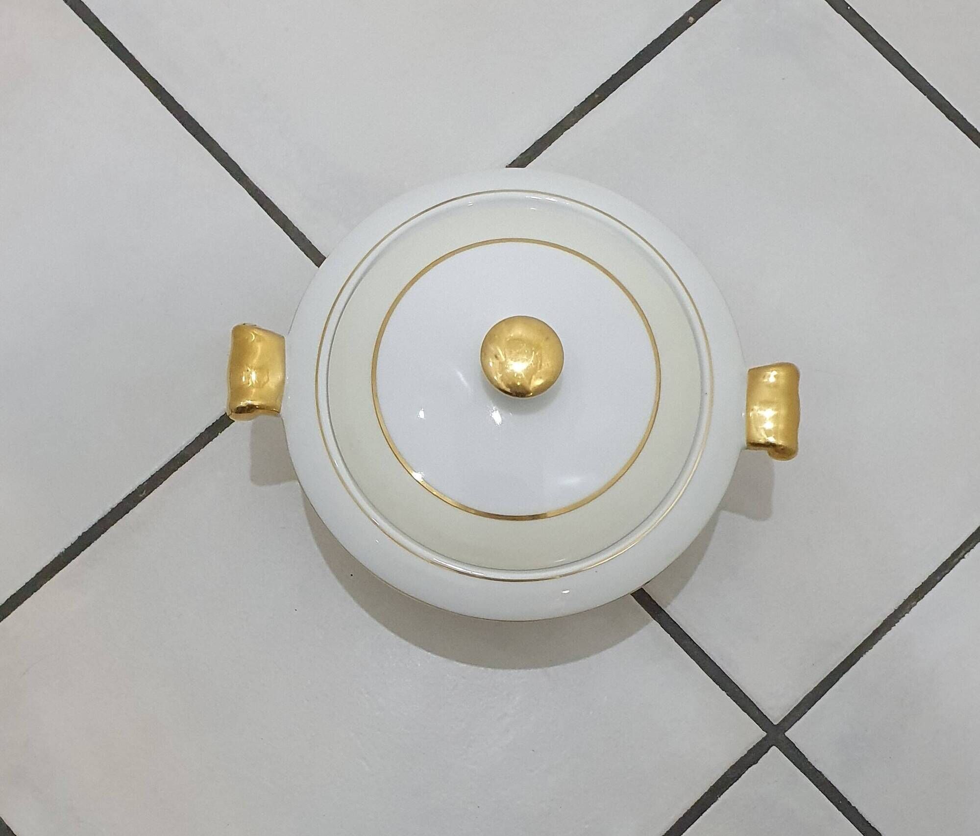 White and yellow porcelain dinner service with gold edging, Poral Limoges France
