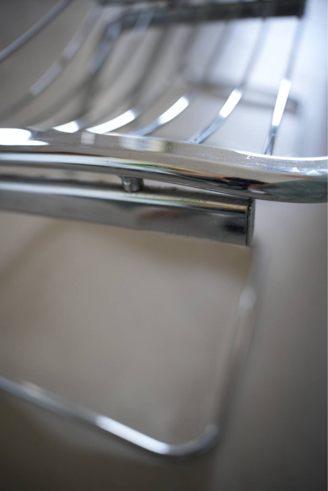 Lot of 2 chrome metal chairs by Gastone Rinaldi.