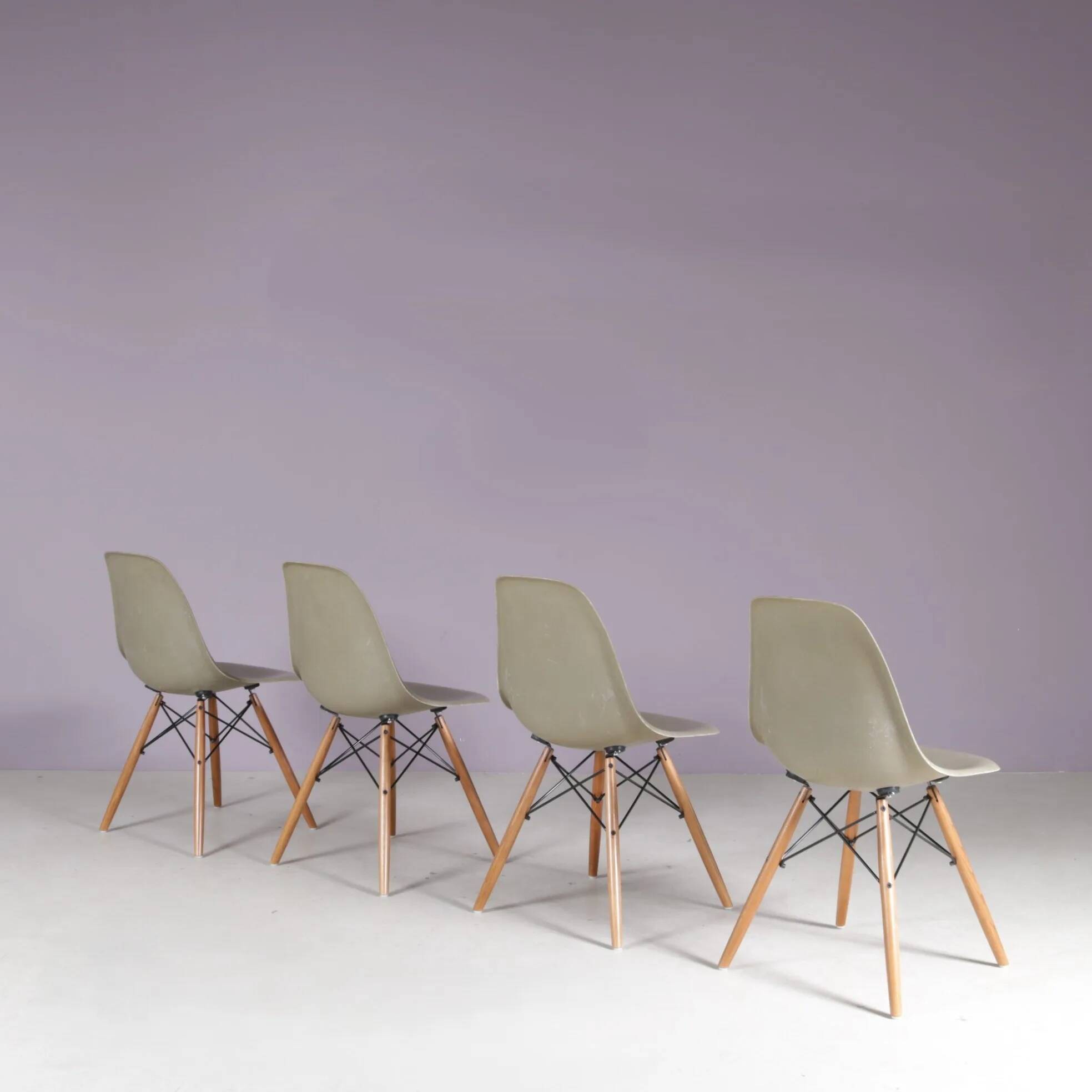1960s set of 4 dining chairs in “sea foam” green fiberglass / Charles & Ray Eames / Herman Miller, USA