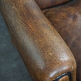 Fauteuil à oreilles en cuir de mouton