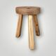 Antique brutalist tripod stool in solid wood