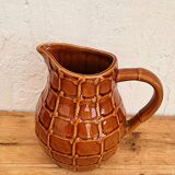 Vintage Saint Clément jug with a caramel checkered design.