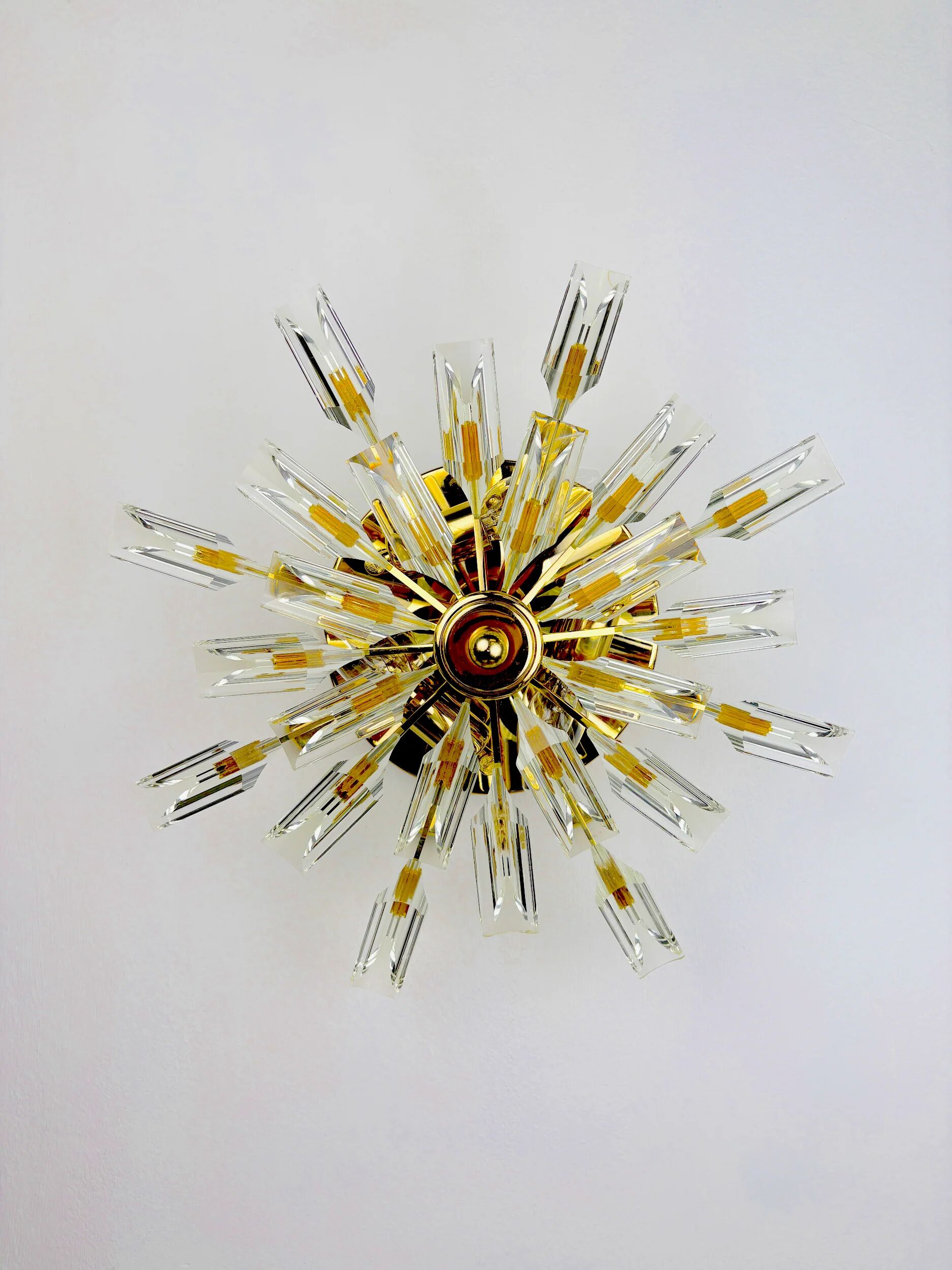 Sun-shaped ceiling or wall light by Oscar Torlasco for StilKronen, cut Murano glass, Italy, 1970s