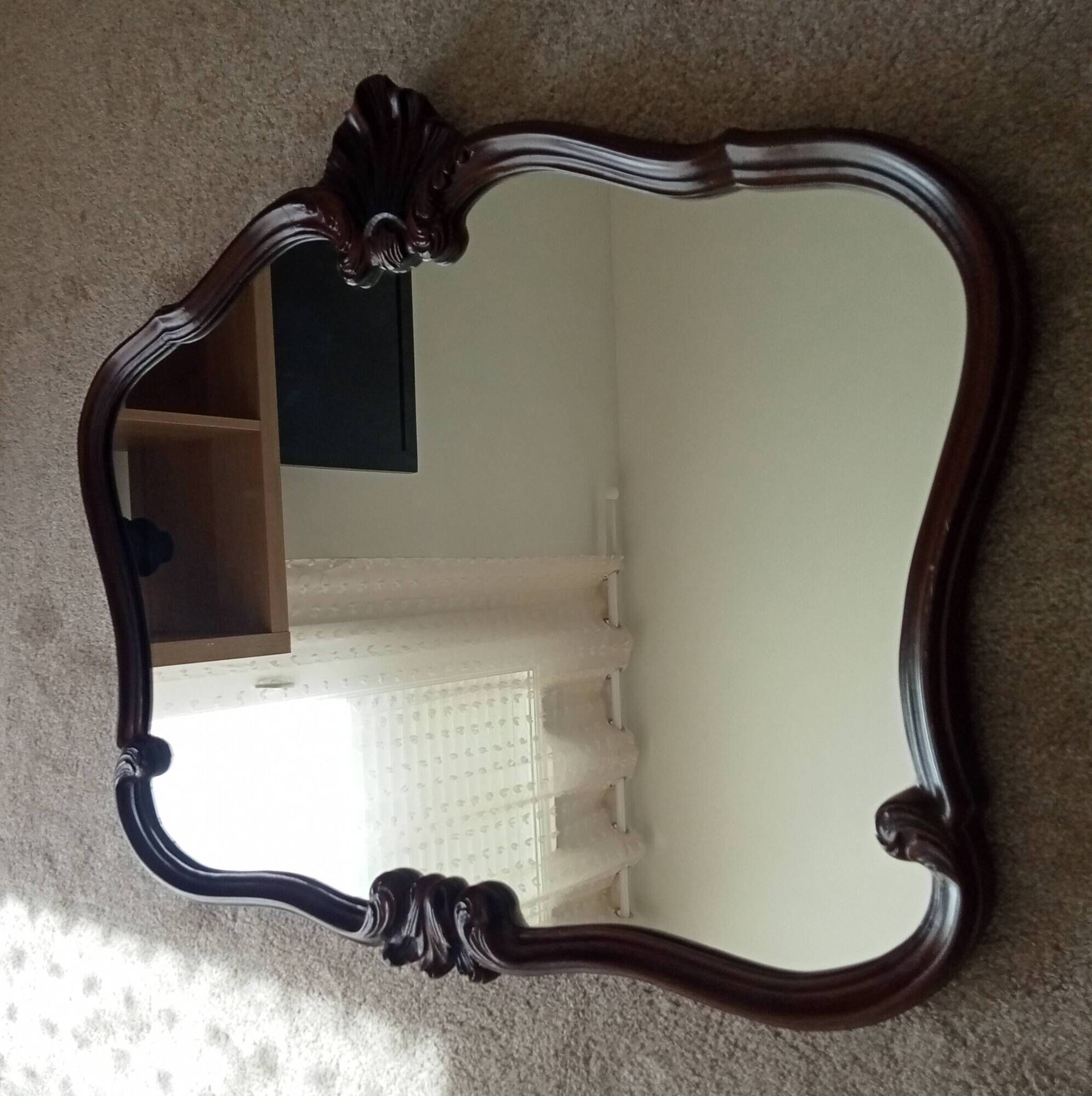 Pair of large antique Rococo style Louis XV mirrors in carved solid wood.