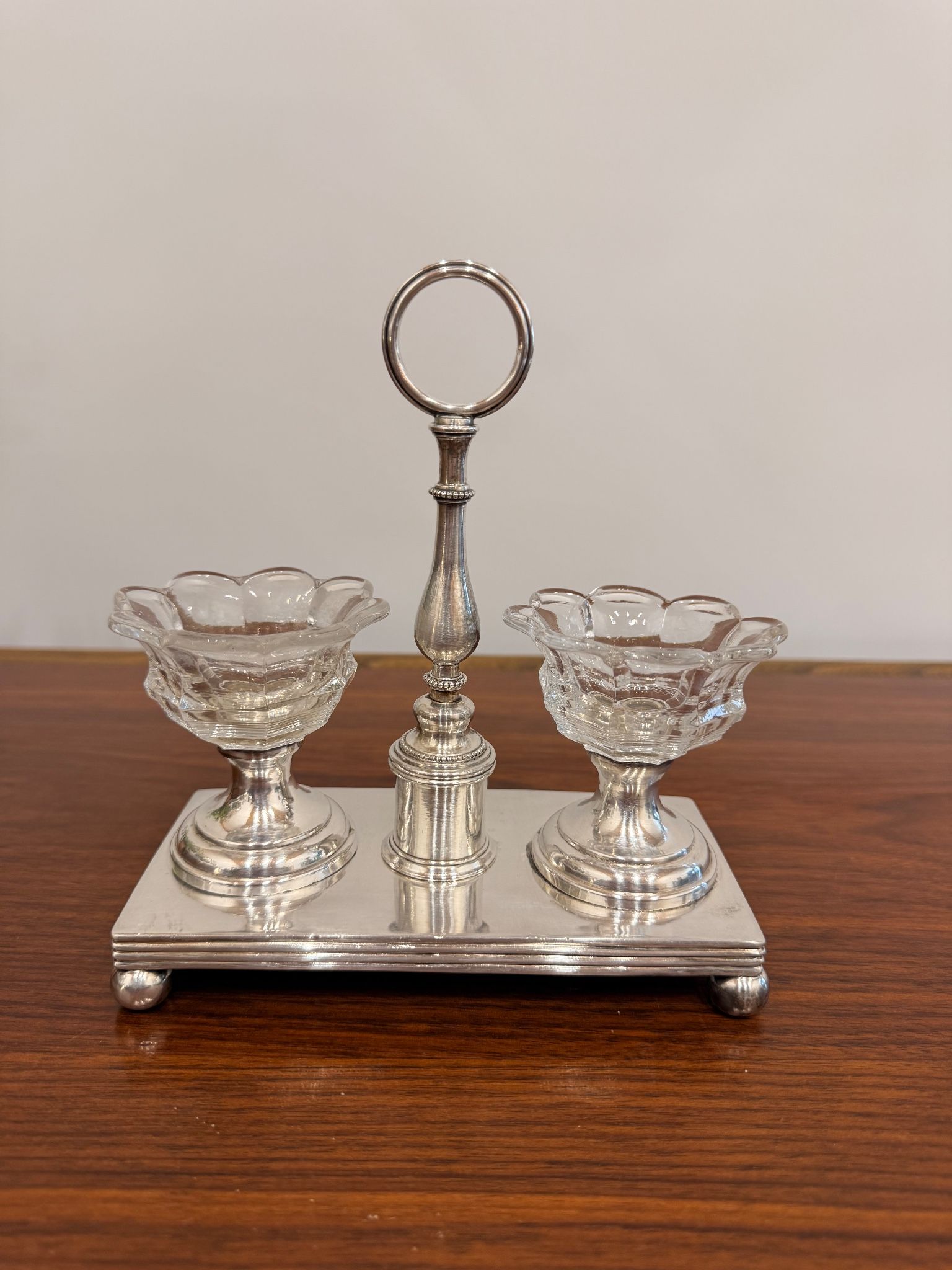 Vintage silver-plated salt and pepper shaker set in crystal.