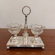 Vintage silver-plated salt and pepper shaker set in crystal.