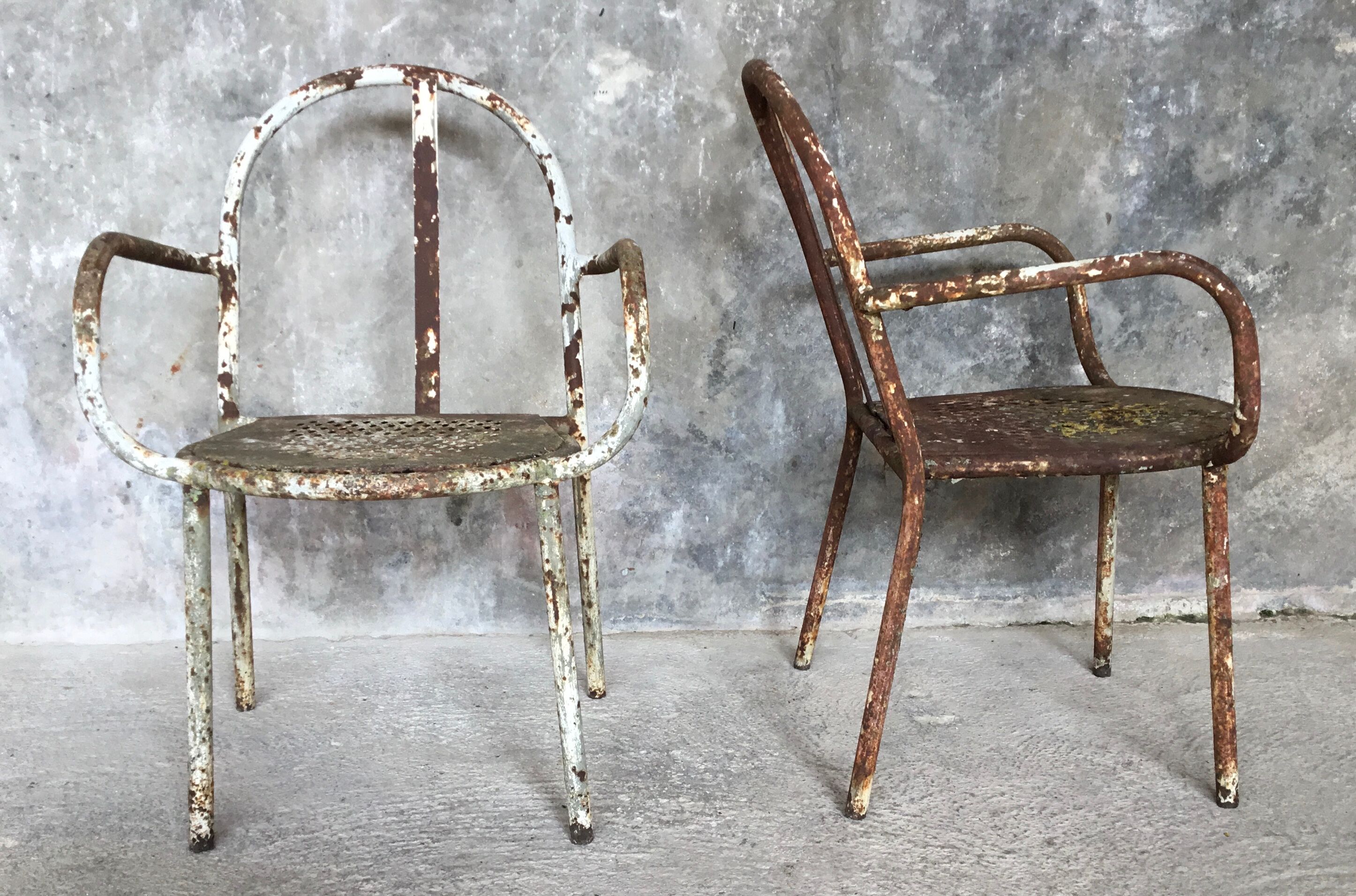 Pair of metal armchairs