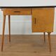 Bureau et chaise Baumann Pégase rouges, pieds compas