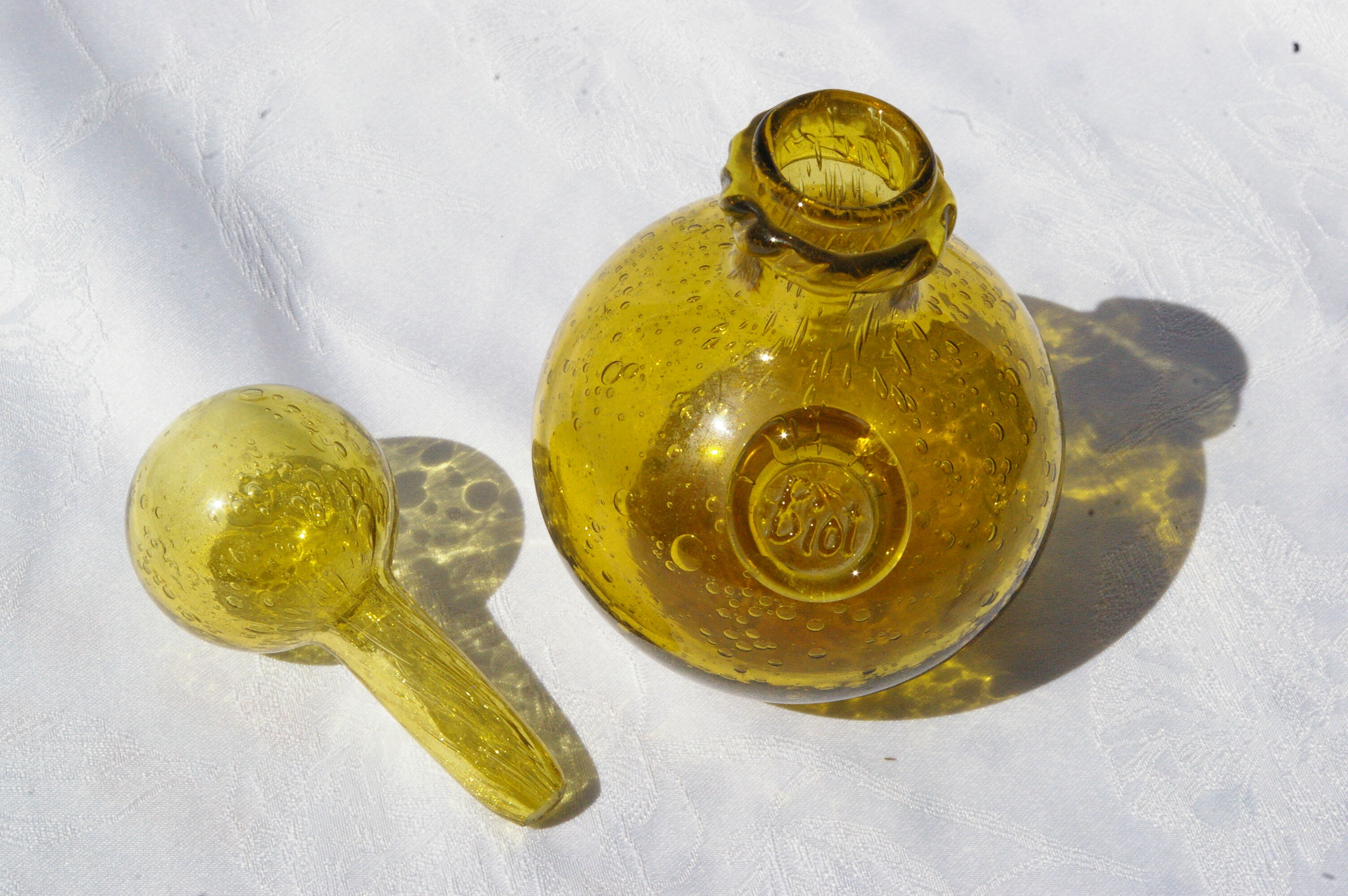 Bottle in bubbled glass of biot