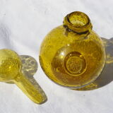 Bottle in bubbled glass of biot