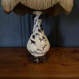 Porcelain lamp in the Indochinese style enhanced with gilding