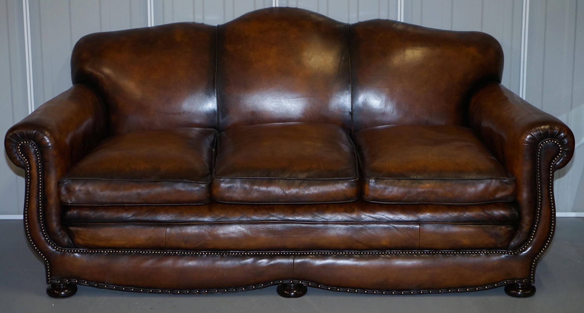Restored vintage leather sofa from a gentleman's Victorian club.