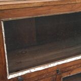 Small wooden glass cabinet with retractable door