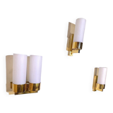 Set of three brass and opaline sconces, mid-century France