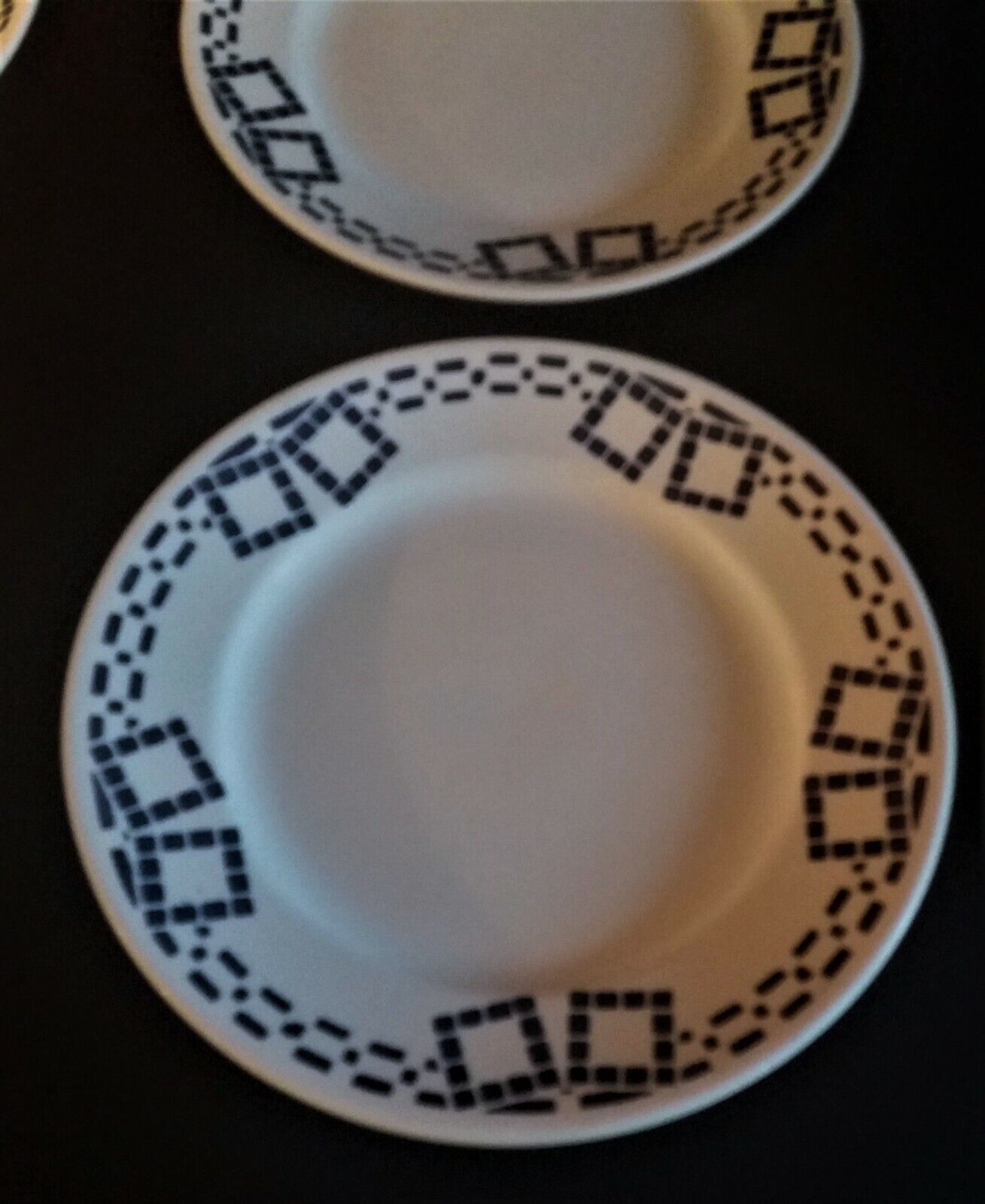 Series of four flat earthenware plates P.B. Rochechouart Limoges model Anna