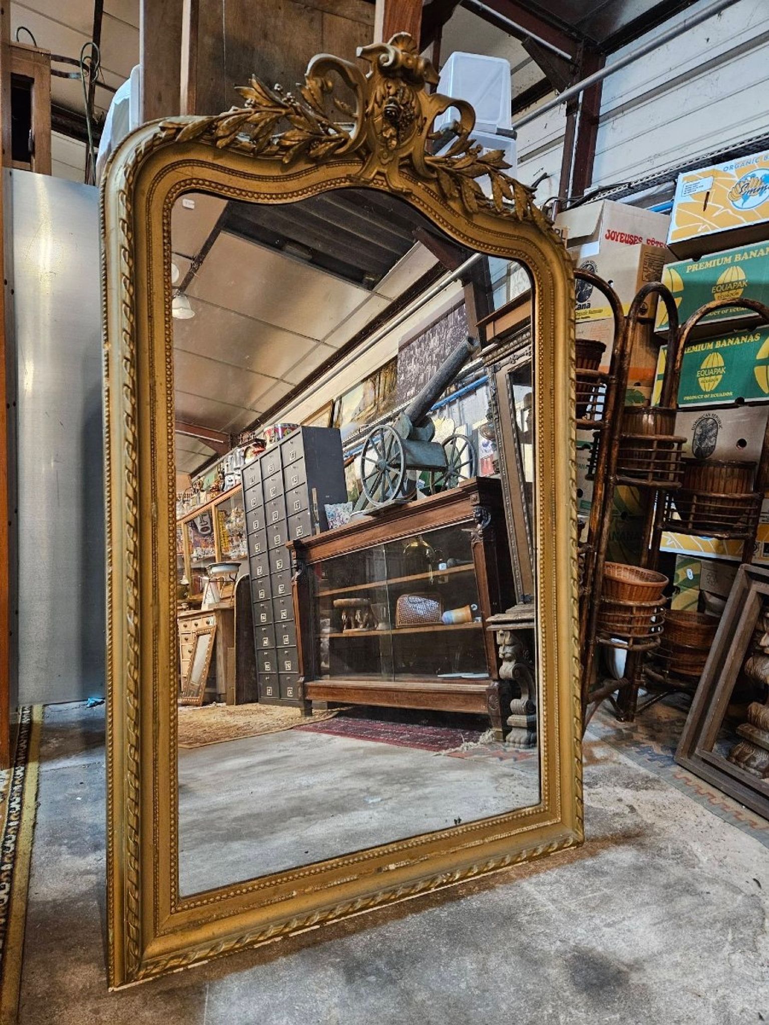 Large carved and gilded wooden mirror in Louis XV style