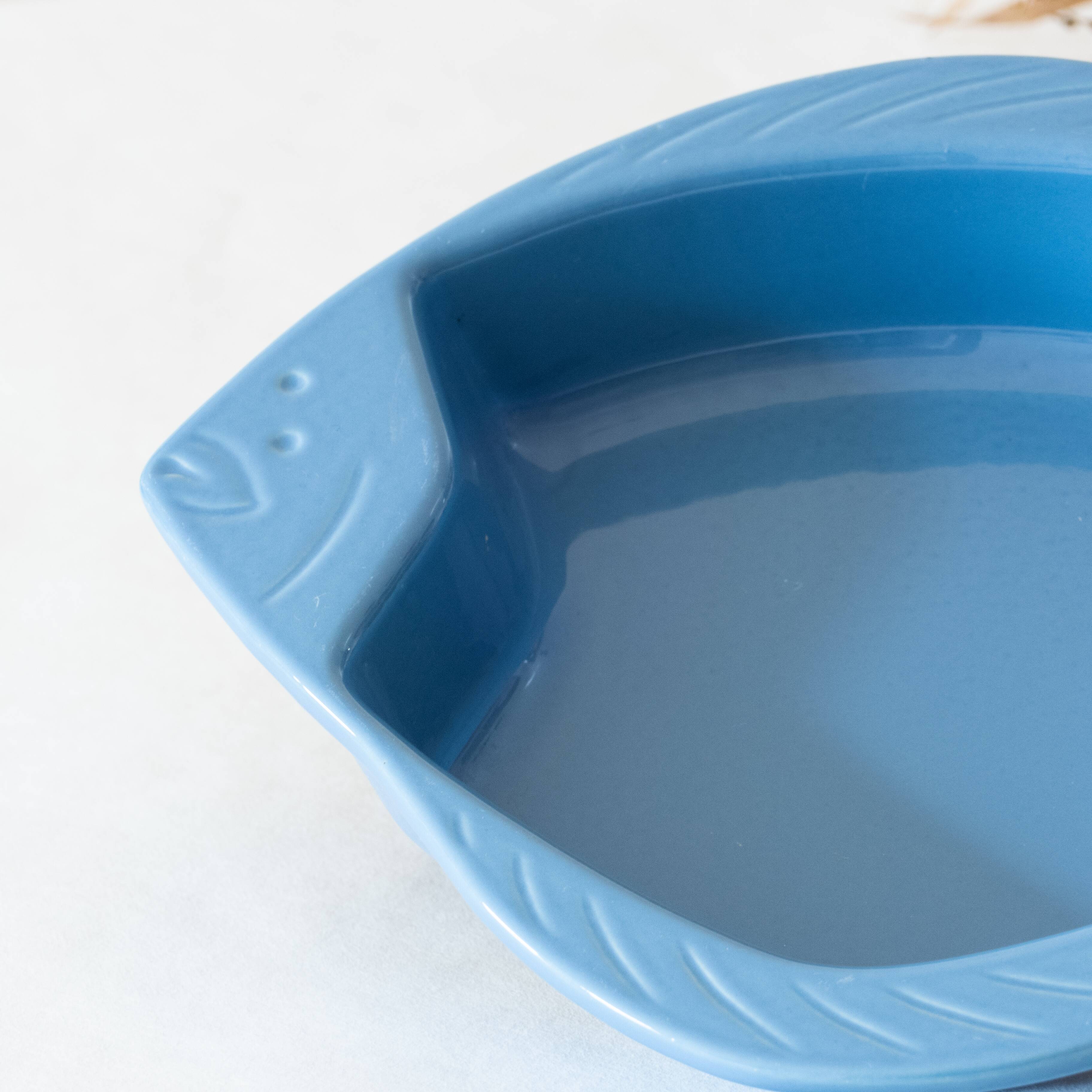 Old dish Emile Henry blue fish